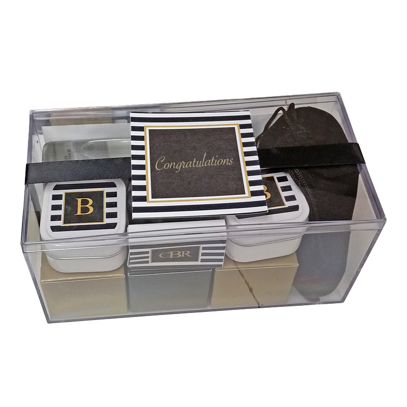 curated gift collection in omni rigid clear plastic box