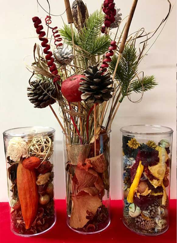 seasonal centerpiece in round tall container