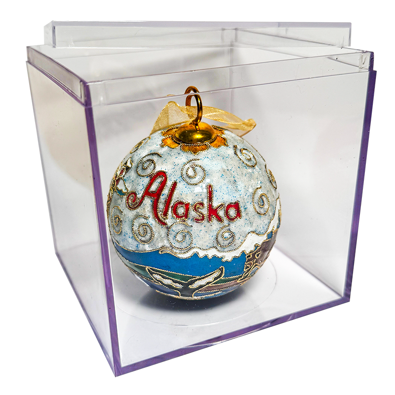 keepsake ornament in rigid plastic box.